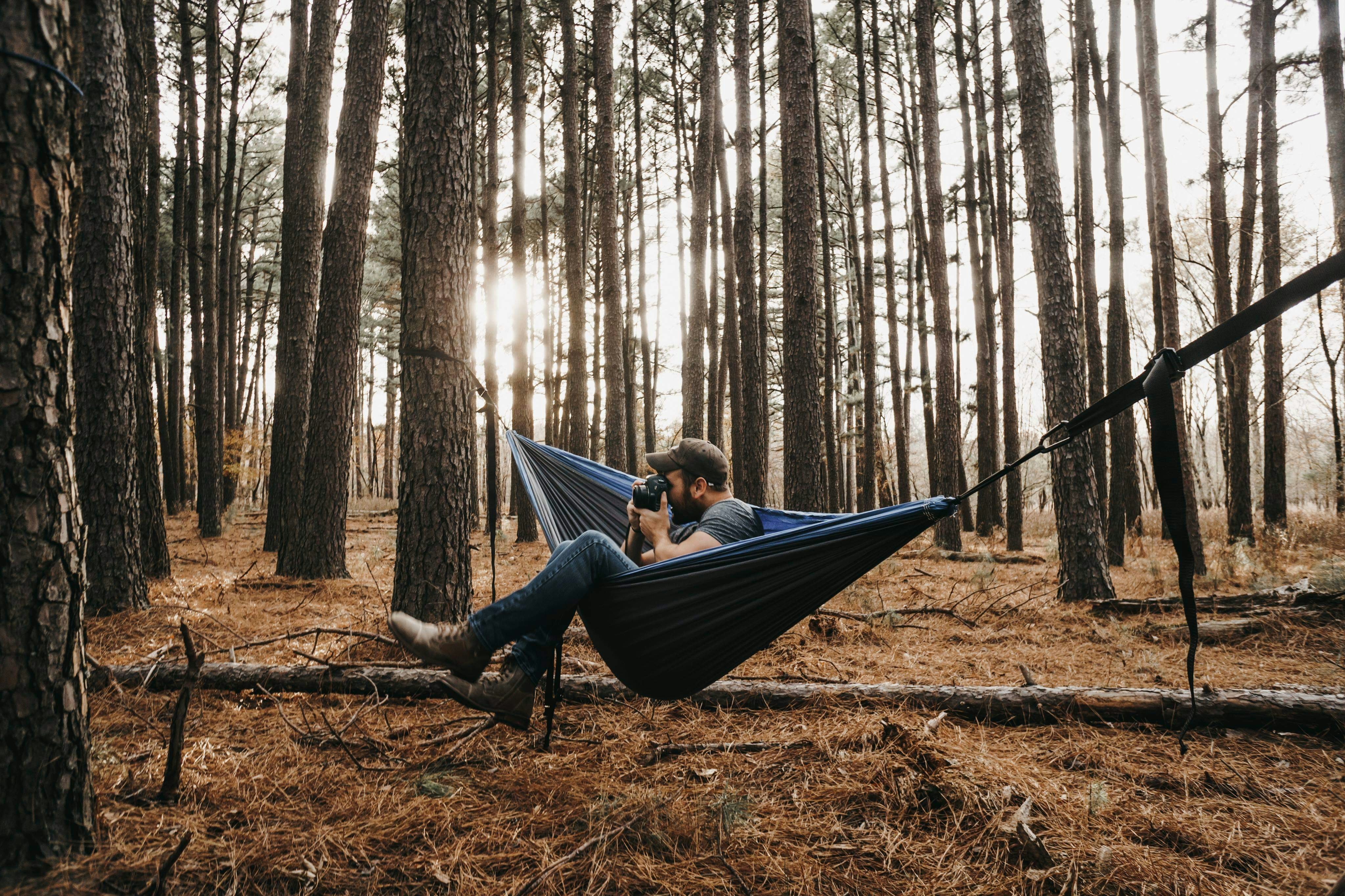 woman sitting on blue swing